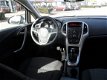 Opel Astra - 1.4 100PK S/S COSMO - 129390 Km - Airco - Aux - Cruise - PDC - 1 - Thumbnail