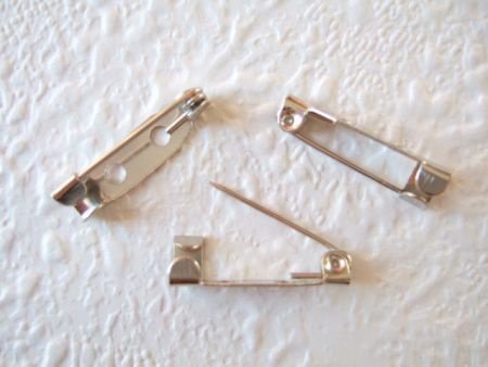 Broche speldje ~ 2 cm - nr. 1