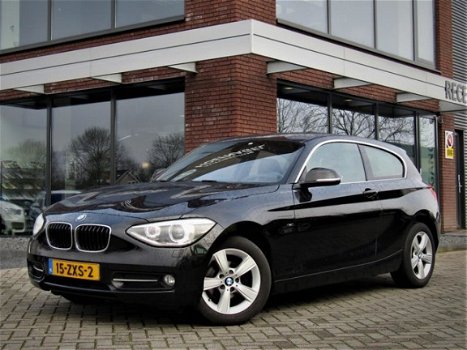 BMW 1-serie - 114i Business+ Sportline Navi Proffesional - 1