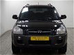 Hyundai Tucson - 2.0 CRDI DYNAMICVERSION 2WD/ CLIMA - 1 - Thumbnail