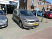 Volkswagen Touran - 1.2 TSI Comfortline BlueMotion 7persoons, Navigatie, Cruise control, Climate con - 1 - Thumbnail
