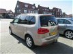Volkswagen Touran - 1.2 TSI Comfortline BlueMotion 7persoons, Navigatie, Cruise control, Climate con - 1 - Thumbnail