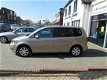 Volkswagen Touran - 1.2 TSI Comfortline BlueMotion 7persoons, Navigatie, Cruise control, Climate con - 1 - Thumbnail