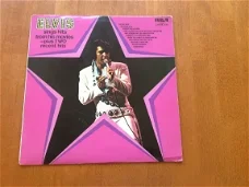 Vinyl Elvis sings hits from his movies - plus two recent hits