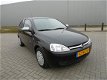 Opel Corsa - 1.2-16V Njoy Zwart Bouwjaar 2003 - 1 - Thumbnail