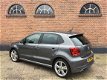 Volkswagen Polo - 1.2 TSI R-Line Navi ECC Cruise Nl Auto - 1 - Thumbnail