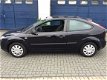 Ford Focus - 1.4-16V Ambiente - 1 - Thumbnail