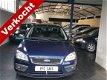 Ford Focus Wagon - 1.6 TDCI GHIA Ex lease dealeronderhouden - 1 - Thumbnail