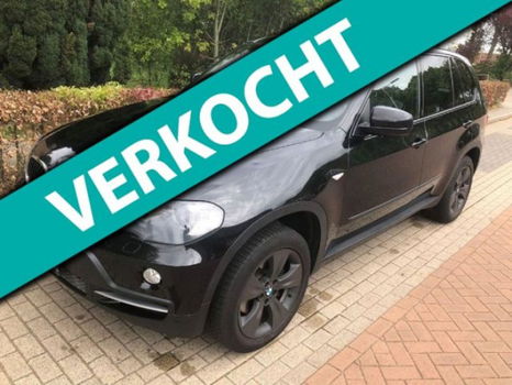 BMW X5 - 3.0d Executive (vier winterbanden + velgen) - 1