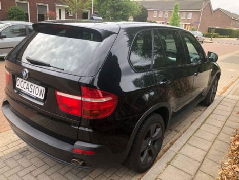 BMW X5 - 3.0d Executive (vier winterbanden + velgen) - 1