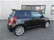 Suzuki Swift - 1.6 Sport 125PK Zwart Airco Navigatie - 1 - Thumbnail