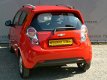 Chevrolet Spark - 1.2I LT 82 pk - Airco - Navi - Elec ramen - lm velgen - 1 - Thumbnail