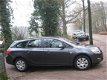 Opel Astra Sports Tourer - 1.4 Edition ,Wagon, Airco, cruise, blue-tooth. - 1 - Thumbnail