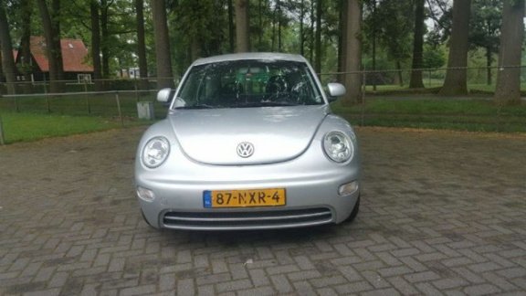 Volkswagen New Beetle - 2.0 Highline - 1