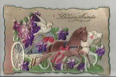 Antieke nieuwjaarskaart met celluloid paard en wagen