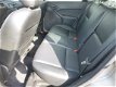 Ford Focus Wagon - 1.6 I Ghia Leer, Cruise, Ecc (apk tot 03-2019) - 1 - Thumbnail