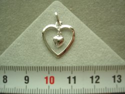 Zilveren hartje met hartje hanger