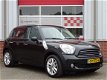 Mini Mini Countryman - 1.6 SALT /NAVI/AIRCO/PDC/17'LM/Carkit/CV/NAP 2e eig - 1 - Thumbnail