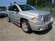 Jeep Compass - 2.4 4X4 LIMITED 170 PK / NAVIGATIE / PARROT / CLIMATE CONTROL / CRUISE CONTROL / ELEK - 1 - Thumbnail