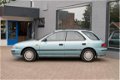 Subaru Impreza Plus - 1.6 GL TREKHAAK/NAP - 1 - Thumbnail