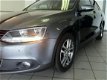 Volkswagen Jetta - 1.6 TDI HIGHLINE LEDER NAVI ALU ELEKT PAKET - 1 - Thumbnail