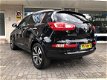 Kia Sportage - 2.0 CRDI X-CLUSIVE 4WD AUTOMAAT * NAVIGATIE + LEDER + CAMERA - 1 - Thumbnail