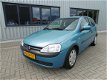 Opel Corsa - 1.0-12V Comfort Apk Keuring Geldig t/m 18-07-2019 - 1 - Thumbnail