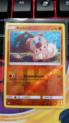 Rockruff  75/131  Common  (reverse) S & M Forbidden Light