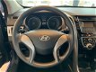 Hyundai i30 - 1.4i i-Drive Cool, met airco - 1 - Thumbnail