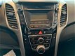 Hyundai i30 - 1.4i i-Drive Cool, met airco - 1 - Thumbnail