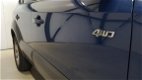 Hyundai Tucson - 2.0i 4WD Style - 4x4, Clima, Cruise, LM, - 1 - Thumbnail