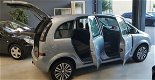 Opel Meriva - 1.6-16V Essentia - Airco, PDC, Cruise, AUX, Trekhaak - 1 - Thumbnail