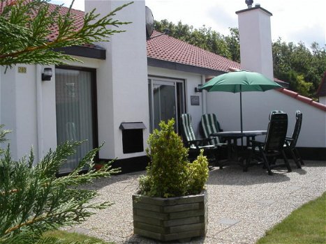 TEXEL Sfeervolle bungalows met openhaard aan bos zee strand - 3