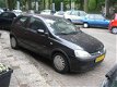 Opel Corsa - 1.0-12V Comfort - 1 - Thumbnail