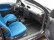 Opel Corsa - 1.0-12V Comfort - 1 - Thumbnail