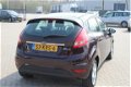 Ford Fiesta - 1.25 TITANIUM airco, radio cd speler, navigatie, elektrische ramen, lichtmetalen wiele - 1 - Thumbnail