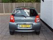 Suzuki Alto - 1.0 5drs exclusive a/c esp rijklaar all in prijs bovag garantie - 1 - Thumbnail