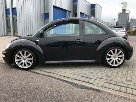 Volkswagen New Beetle - 2.0 Highline - 1