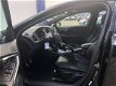 Volvo V40 - D4 190pk R-Design / Navigatie / cruise control / Airco - 1 - Thumbnail