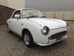 Nissan Figaro - 594 wit, automaat, airco, turbo - 1 - Thumbnail