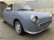 Nissan Figaro - 334 Lapisgrijs met speciale graphics - 1 - Thumbnail