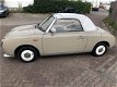 Nissan Figaro - 710 Topaz Mist (beige) - 1 - Thumbnail