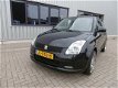 Suzuki Swift - 1.3 GLS Airco Zwart LM Wielen 17 Inch - 1 - Thumbnail