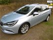 Opel Astra Sports Tourer - TURBO-EDITION/OPENDAK/LM VELGEN/I-LINK/INR&GAR.MOGELIJK - 1 - Thumbnail