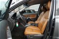 Volvo XC90 - 2.4 D5 R-Design 7-PERS/BRUIN LEDER/NAVI/CRUISE/TREKHAAK - 1 - Thumbnail
