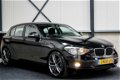 BMW 1-serie - 114i EDE Executive 102pk 2e Eig|Origineel NL|Navigatie|Airco|BT|18inch LM|PDC|Cruise - 1 - Thumbnail