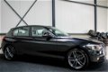 BMW 1-serie - 114i EDE Executive 102pk 2e Eig|Origineel NL|Navigatie|Airco|BT|18inch LM|PDC|Cruise - 1 - Thumbnail