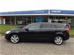 Volvo V60 - 2.0 D3 / 5 Cilinder / Momentum / Automaat / Leer / Navigatie / 17'' / PDC voor & achter - 1 - Thumbnail