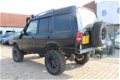 Land Rover Discovery - 1 300 tdi (verhoogd) terreinauto - 1 - Thumbnail