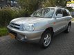 Hyundai Santa Fe - 2.4i-16V Elite 146pk Leder Schuifdak Trekhaak 2000kg - 1 - Thumbnail